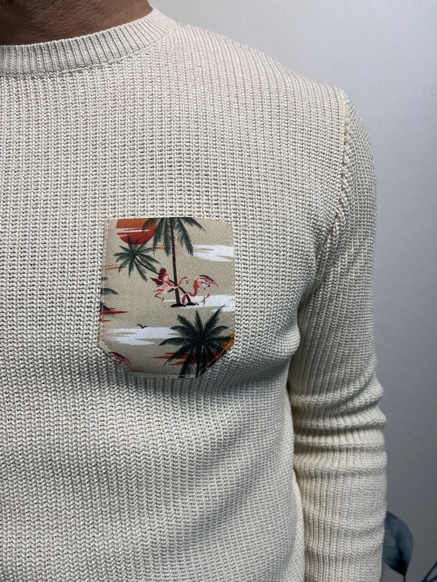 MAGLIONE CON TASCHINO