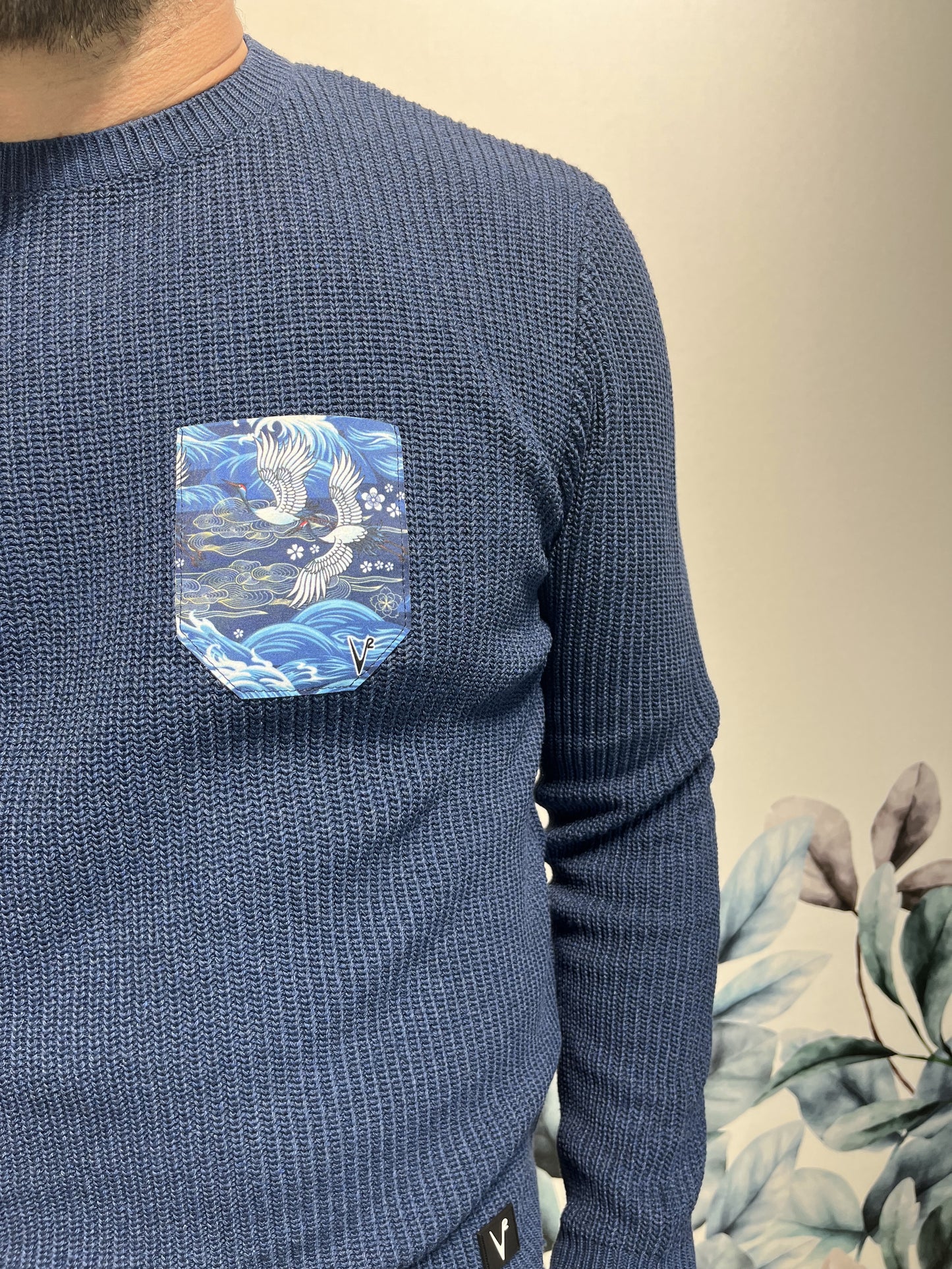 MAGLIONE CON TASCHINO