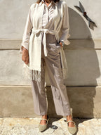 GILET SMANICATO CON FRANGE