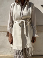 GILET SMANICATO CON FRANGE