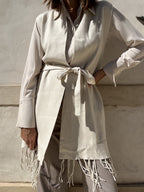 GILET SMANICATO CON FRANGE