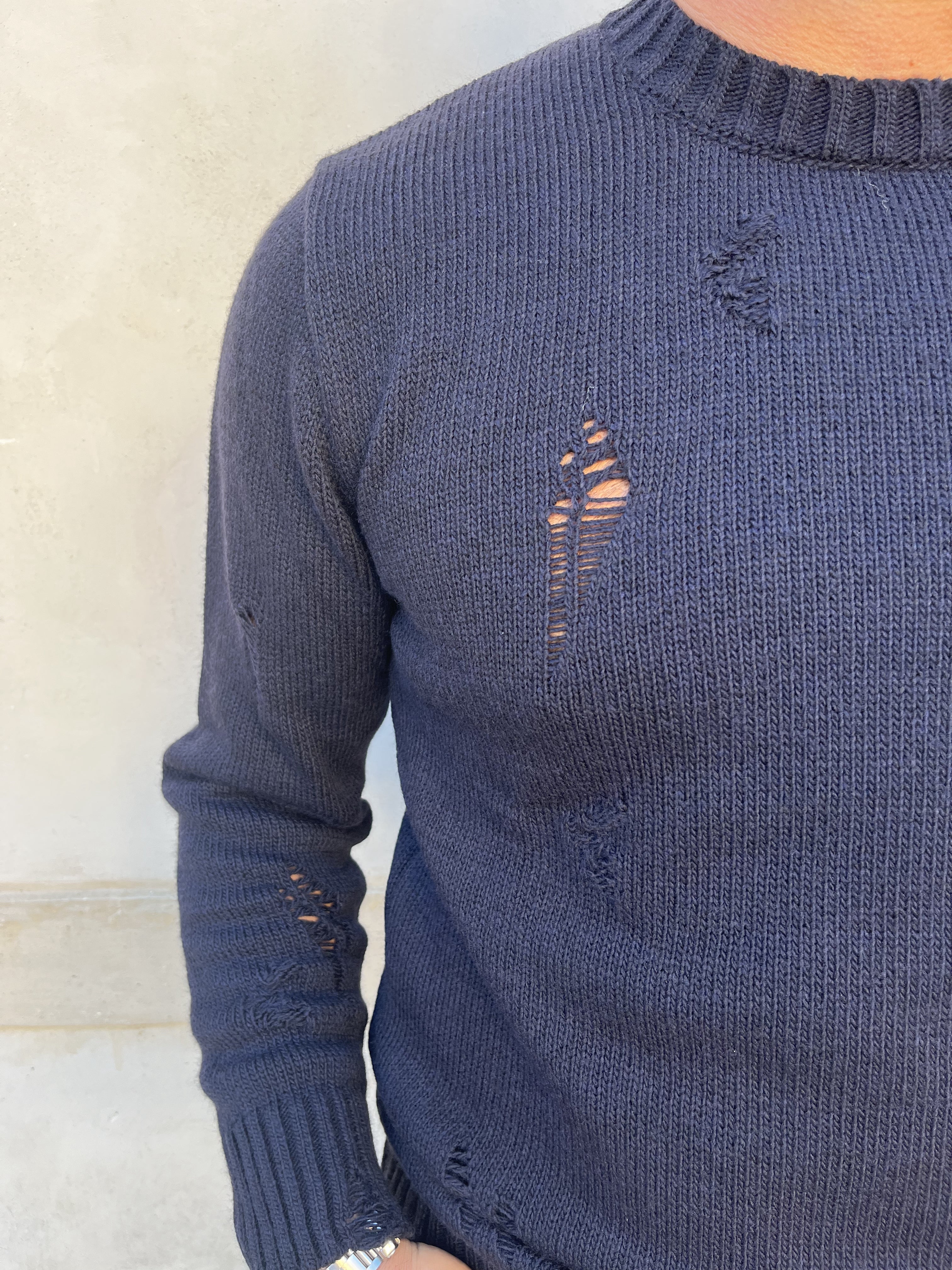 MAGLIONE CON ROTTURE