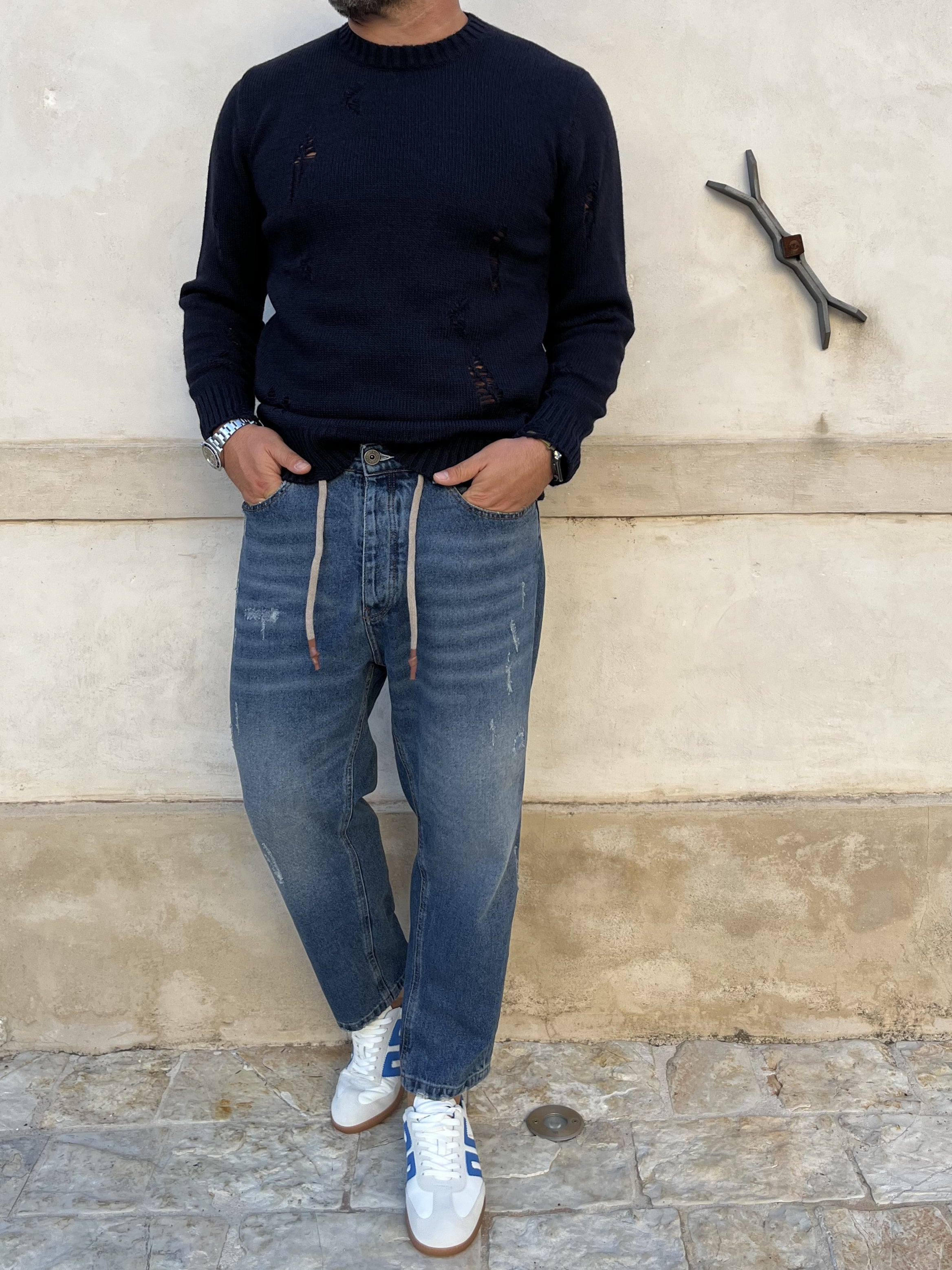 MAGLIONE CON ROTTURE