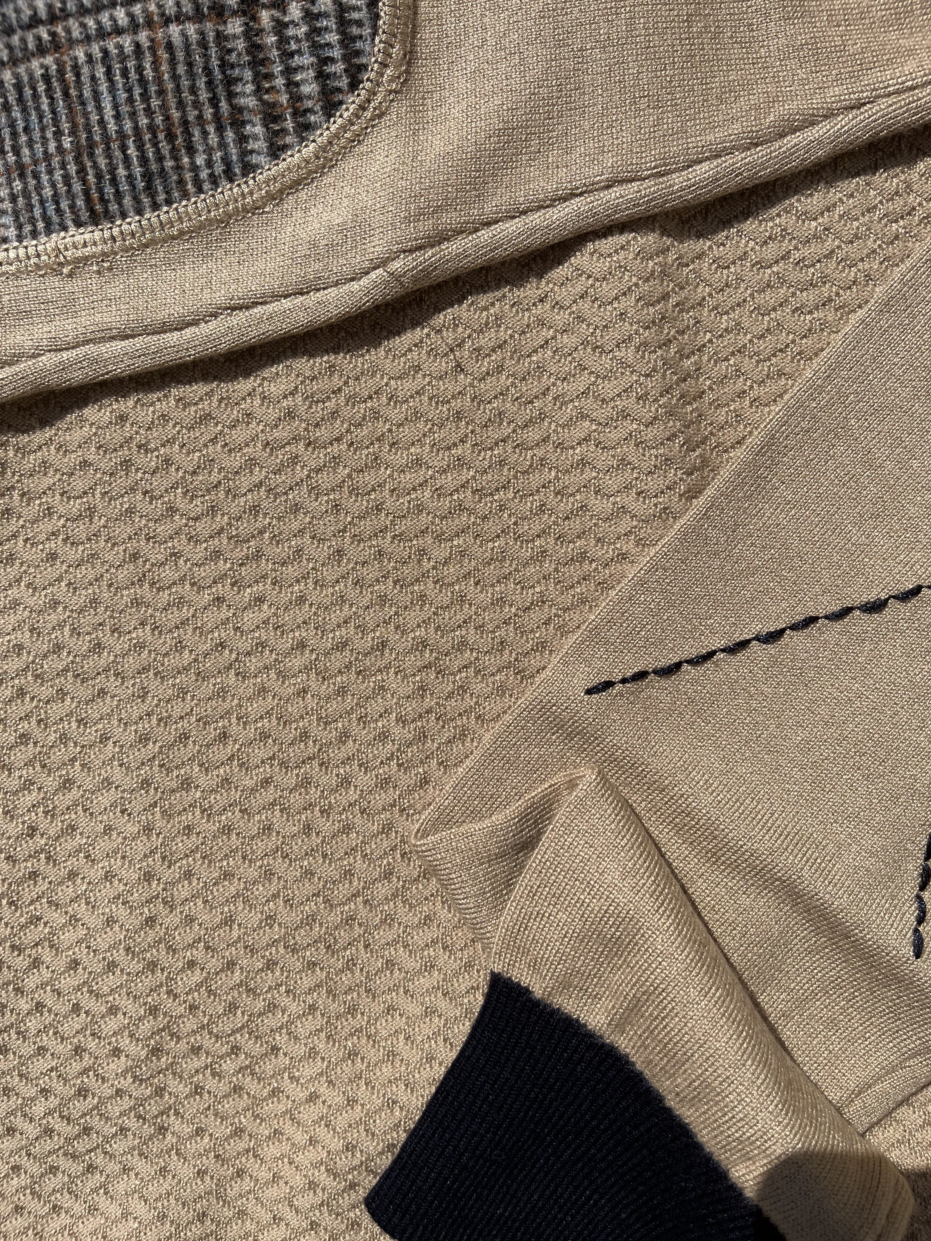 MAGLIONE CON TOPPA