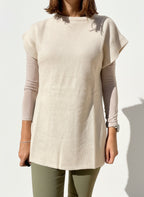 MAGLIA SMANICATA CON SPACCHI