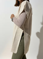 MAGLIA SMANICATA CON SPACCHI
