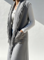 GILET CON TASCONI E FRANGE