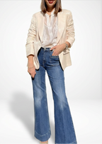 JEANS FLAIRE CON TASCHINE